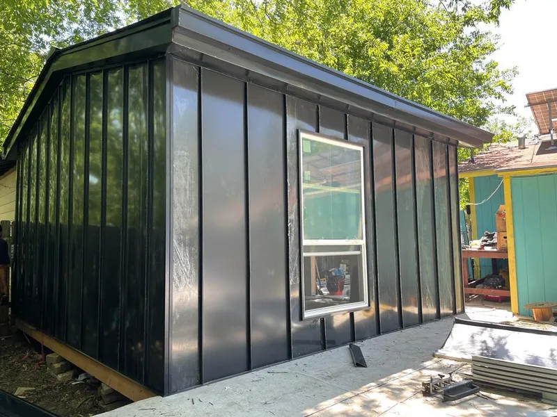 Black standing seam metal wall panels for Roof Inspection in Ludlow